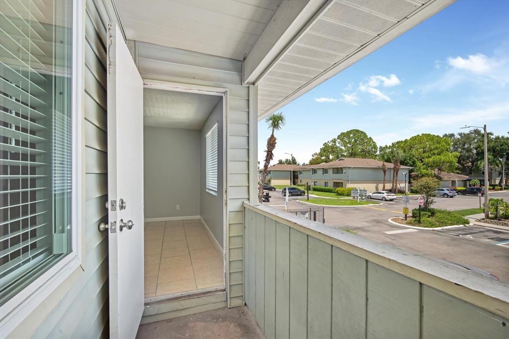 638 Golden Raintree Place Brandon, FL 33510 - Photo 15 of 21 a view of a kitchen from a balcony