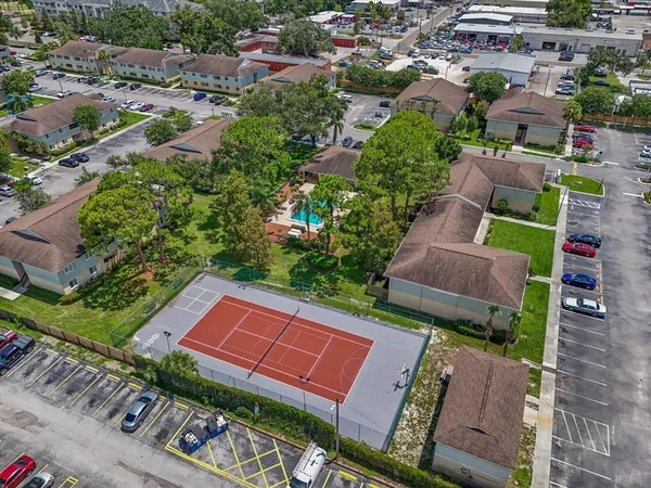 an aerial view of a house with a garden