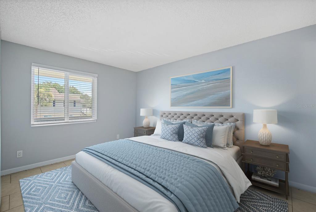 638 Golden Raintree Place Brandon, FL 33510 - Photo 9 of 21 a bedroom with a bed and a window