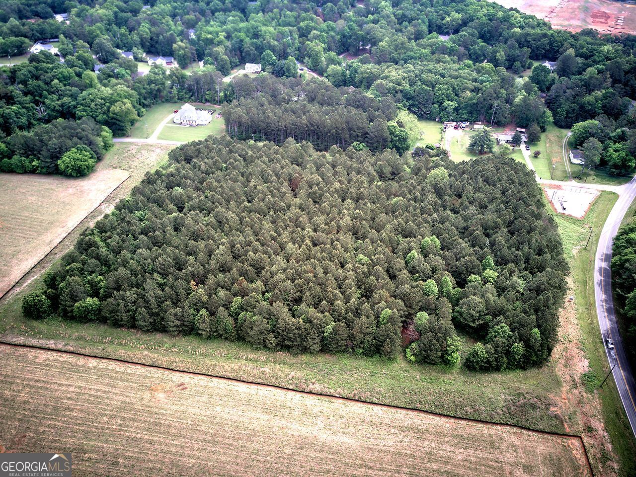 720 Euharlee Road Cartersville, GA 30120 - Photo 6 of 13 a view of a yard with plants and large trees