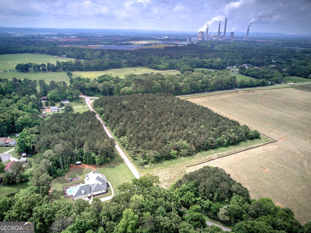 720 Euharlee Road Cartersville, GA 30120 - Photo 10 of 13 an aerial view of a house with a yard