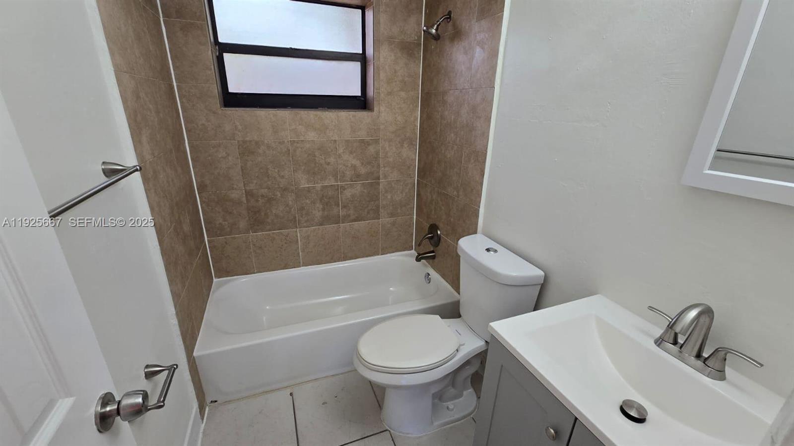 6134 Southwest 40th Court Miramar, FL 33023 - Photo 12 of 15 a bathroom with a sink toilet and shower