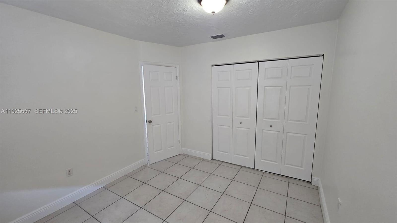 6134 Southwest 40th Court Miramar, FL 33023 - Photo 14 of 15 a view of an empty room