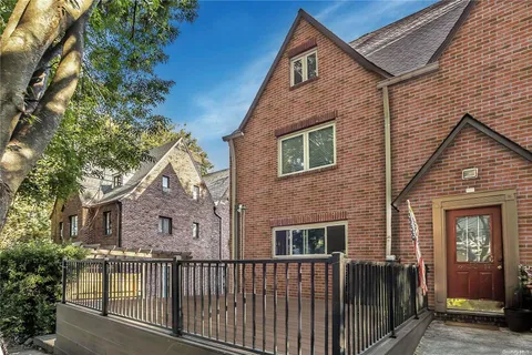 a front view of a house with a porch