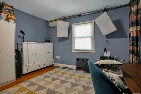 a kitchen with a stove a sink and a window