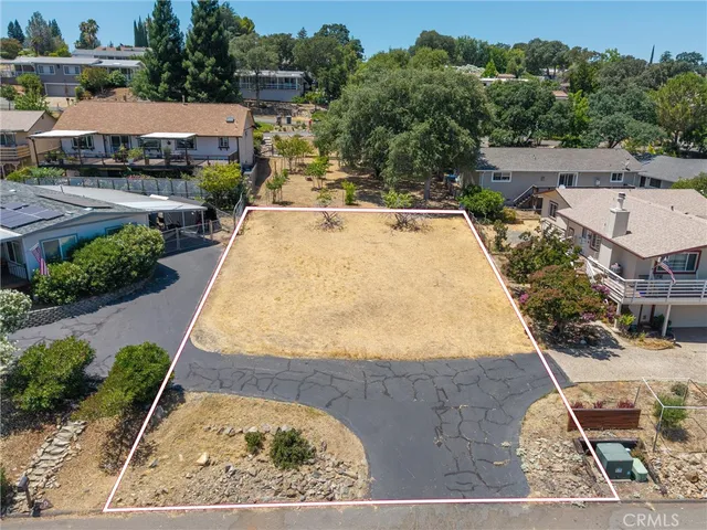 an aerial view of a house with garden