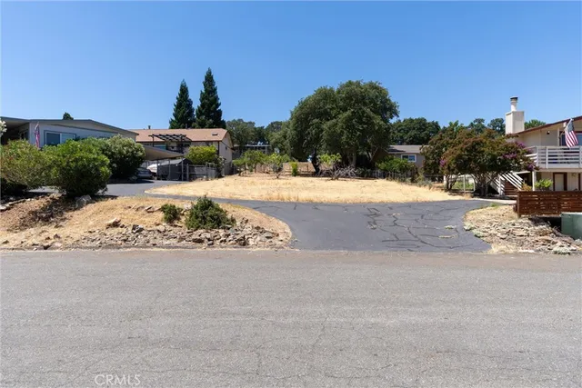a view of a road with a yard