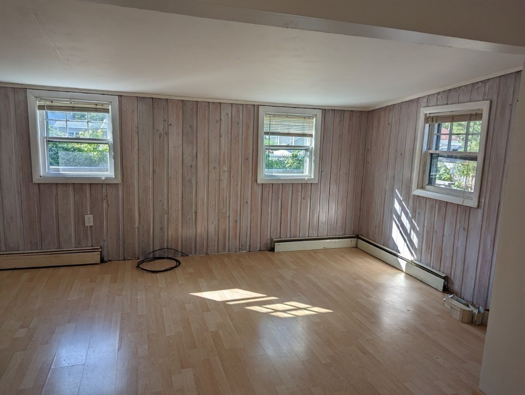 12 Howard Street Wareham, MA 02571 - Photo 6 of 11 an empty room with windows