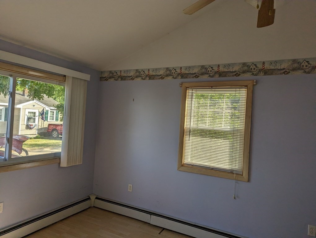 12 Howard Street Wareham, MA 02571 - Photo 8 of 11 a view of an empty room with a window