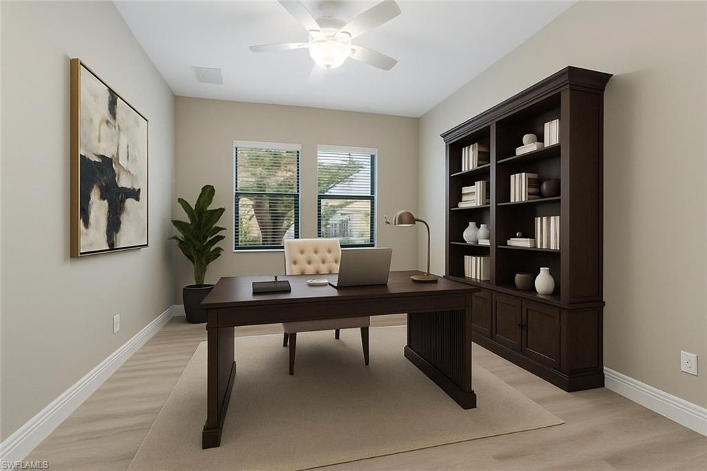 4711 Abaca Circle Naples, FL 34119 - Photo 13 of 32 a view of a workspace with furniture