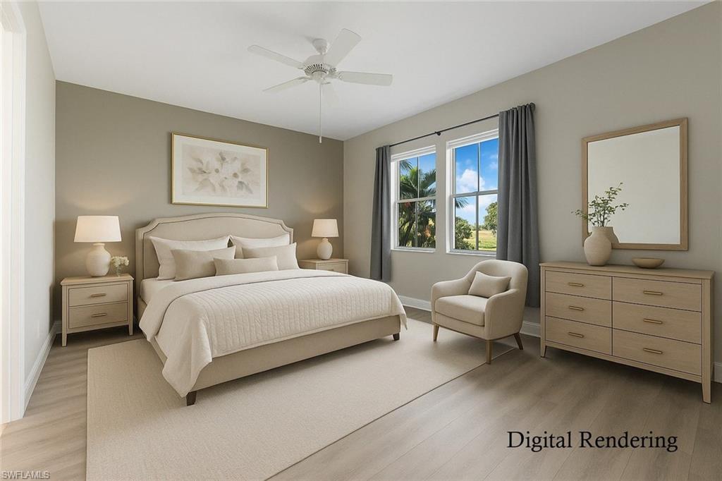 4711 Abaca Circle Naples, FL 34119 - Photo 16 of 32 a bedroom with a bed and a couch