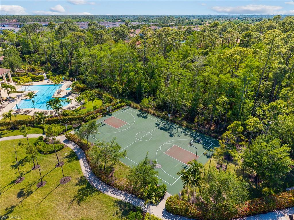 4711 Abaca Circle Naples, FL 34119 - Photo 32 of 32 a view of a garden