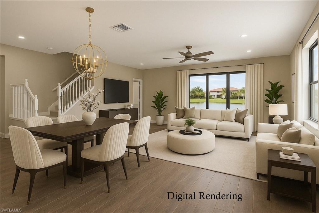 4711 Abaca Circle Naples, FL 34119 - Photo 7 of 32 a living room with furniture a chandelier and a flat screen tv