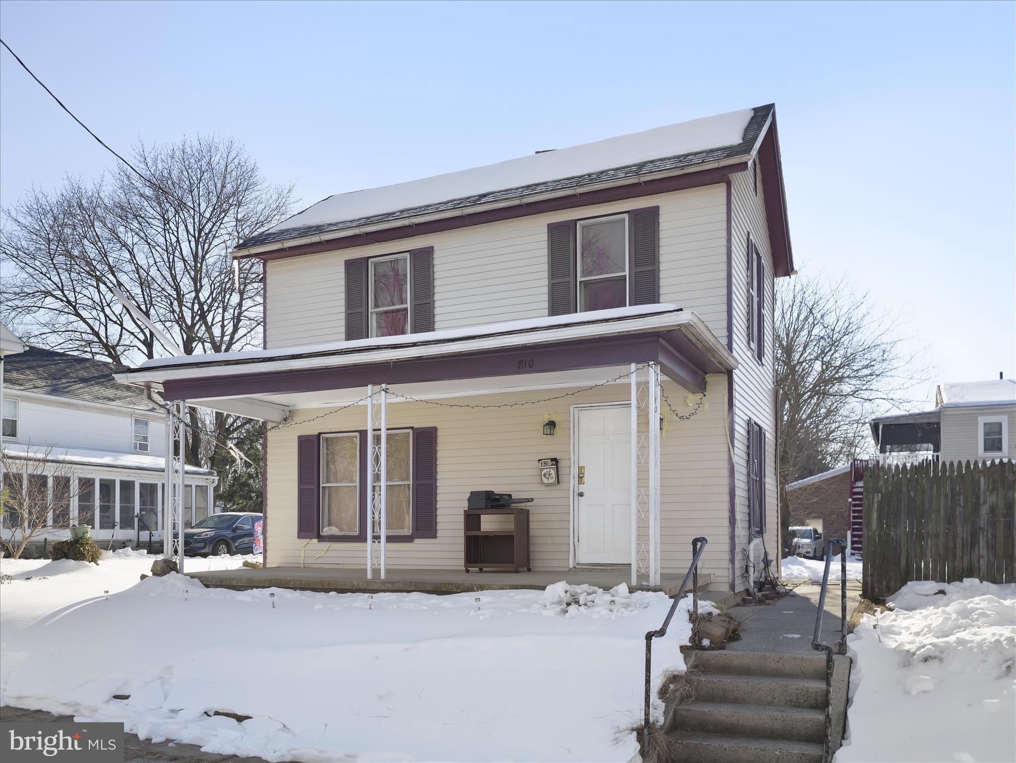810 Broad Street Chambersburg, PA 17201 - Photo 3 of 16 a view of a house with a patio