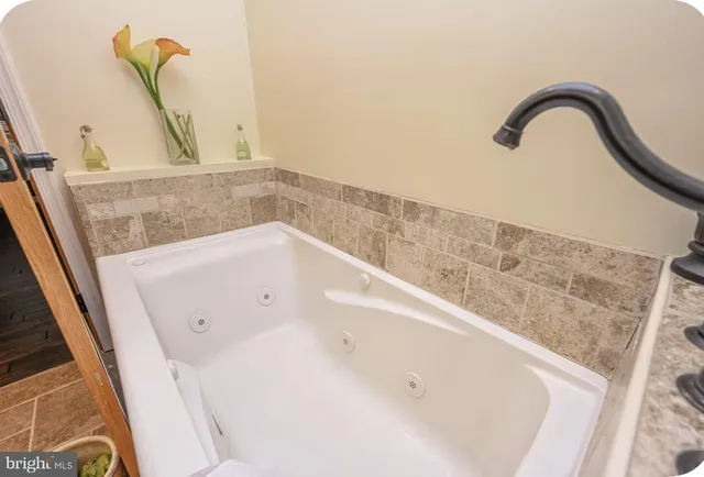 a bathroom with a bathtub