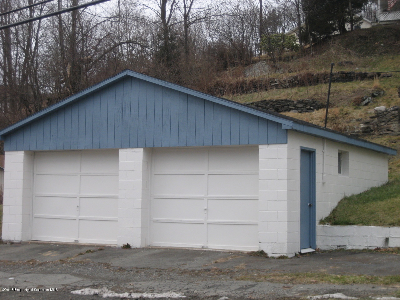 99 Jefferson Street Simpson, PA 18407 - Photo 16 of 16 a house with a outdoor space
