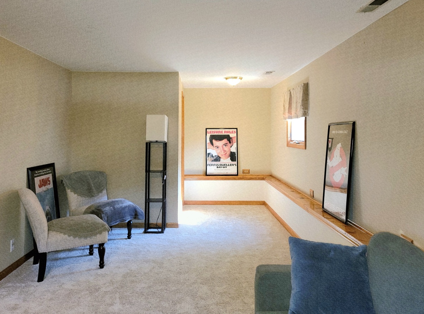 205 Countryside Lane Lindenhurst, IL 60046 - Photo 23 of 33 a living room with furniture and a flat screen tv