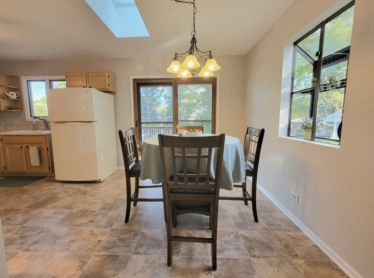 205 Countryside Lane Lindenhurst, IL 60046 - Photo 8 of 33 a view of a dining room with furniture window and outside view