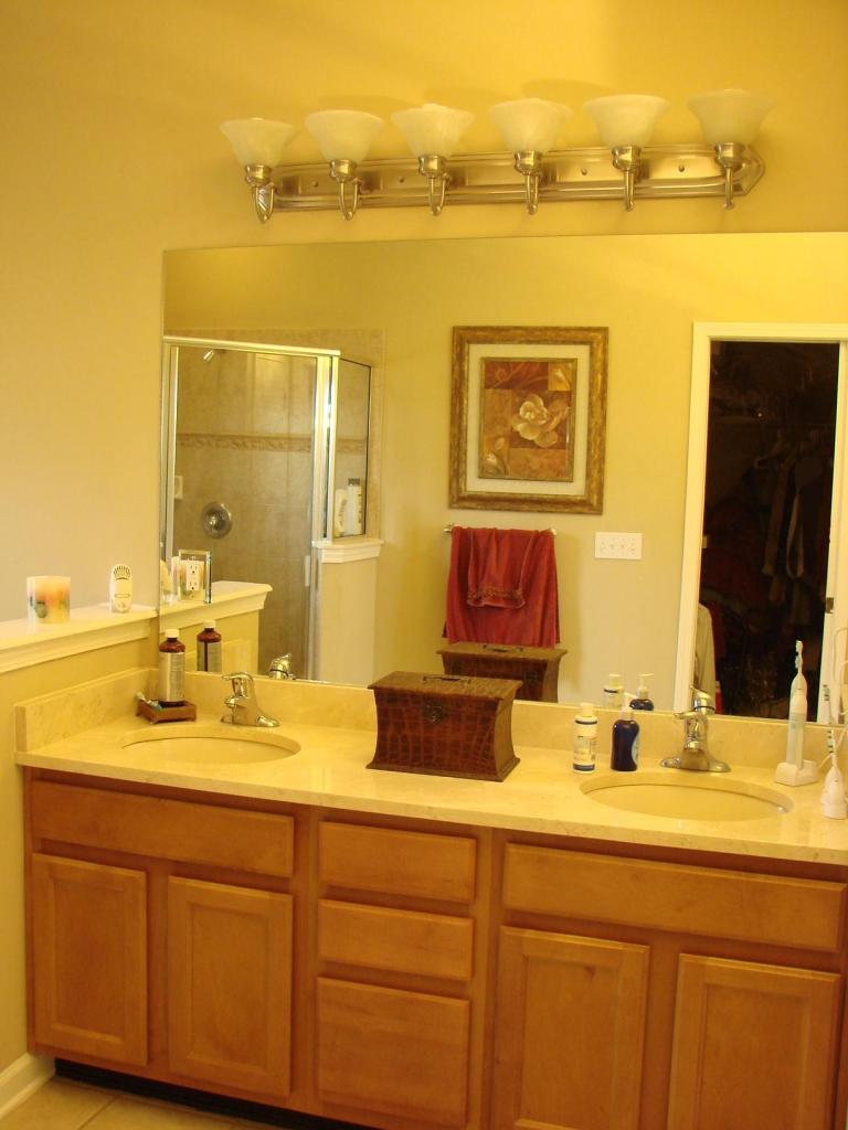 2018 River's Own Road St. Augustine, FL 32092 - Photo 16 of 32 a bathroom with a granite countertop sink and a mirror