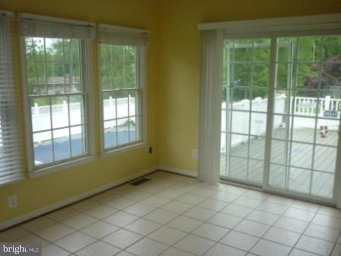 1413 Woodridge Manor Road Fallston, MD 21047 - Photo 18 of 21 a view of an empty room and window