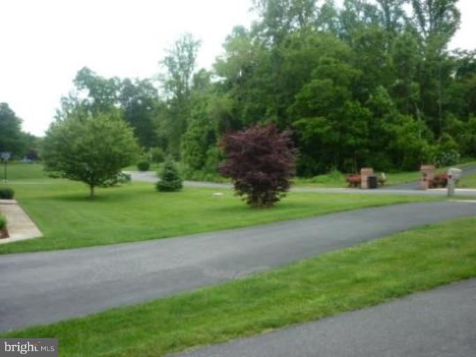 1413 Woodridge Manor Road Fallston, MD 21047 - Photo 20 of 21 a green field with lots of trees