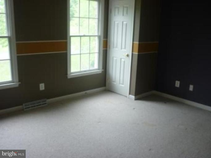 1413 Woodridge Manor Road Fallston, MD 21047 - Photo 6 of 21 an empty room with windows