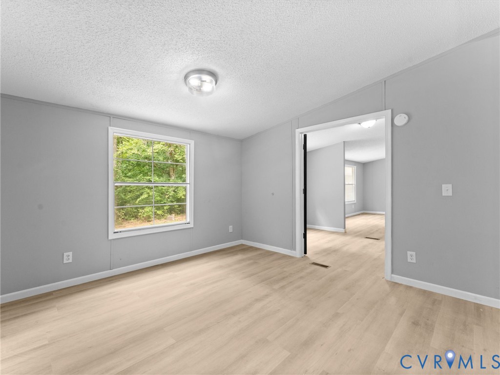 1909 Neves Road Beaverdam, VA 23015 - Photo 20 of 48 Bright corner bedroom featuring abundant natural l