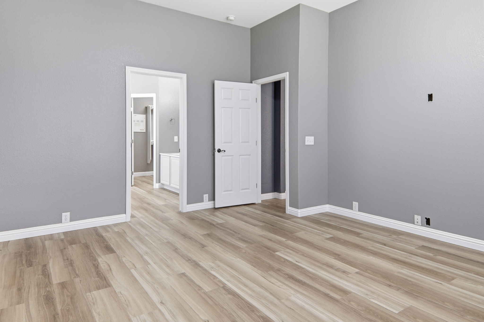 2157 Paradise Ridge Drive Round Rock, TX 78665 - Photo 23 of 34 a view of an empty room with wooden floor