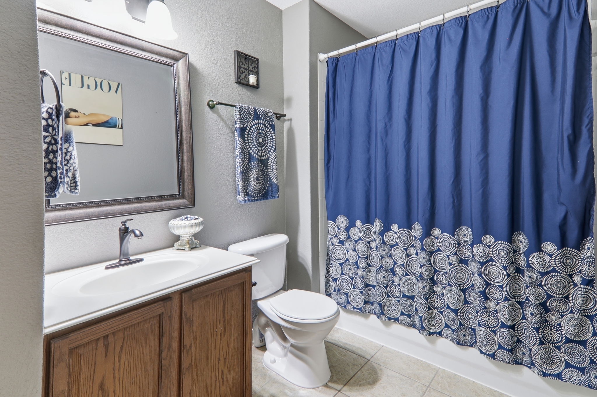 2157 Paradise Ridge Drive Round Rock, TX 78665 - Photo 28 of 34 a bathroom with a toilet a sink and garden
