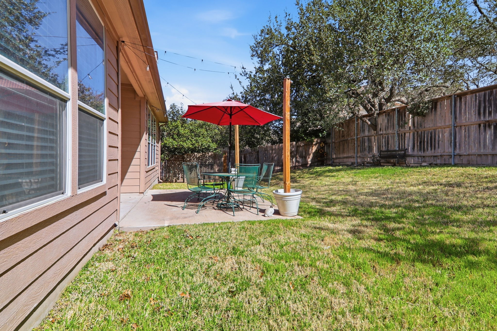 2157 Paradise Ridge Drive Round Rock, TX 78665 - Photo 33 of 34 a view of a house with backyard and sitting area