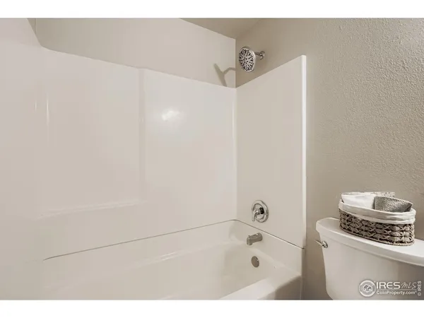 a bathroom with a sink vanity and a mirror