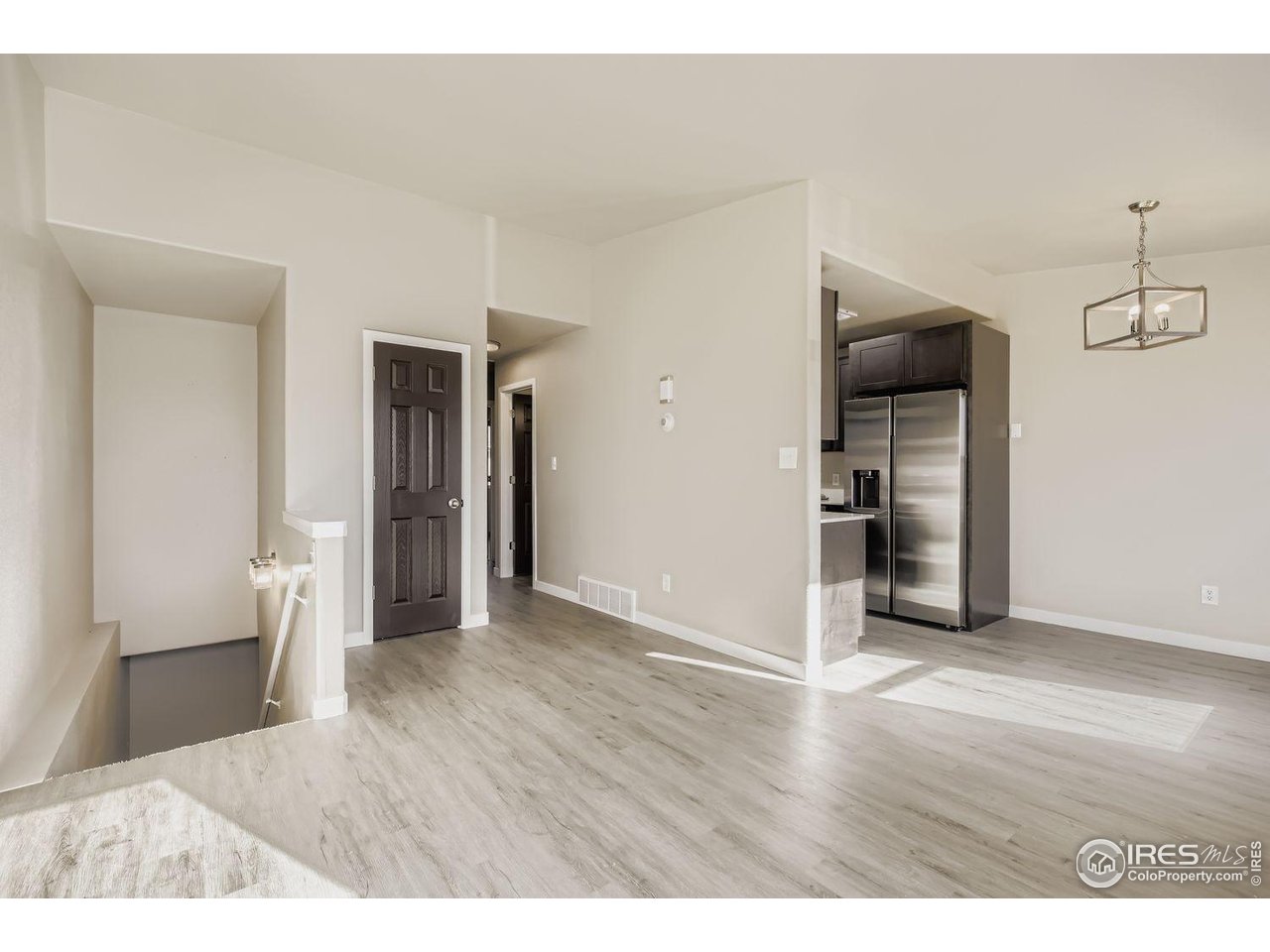 1303 Darrell Road Evans, CO 80620 - Photo 7 of 31 a view interior of the house and wooden floor