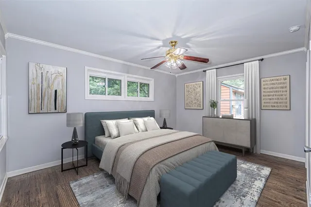 a bedroom with a large bed and a window