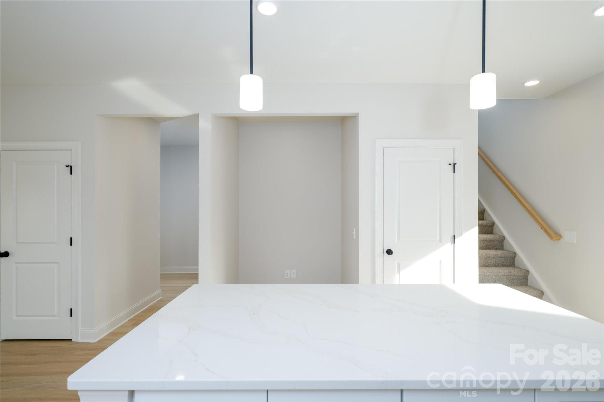 1816 East Greenbriar Road Statesville, NC 28625 - Photo 11 of 34 a view of an empty room with wooden floor
