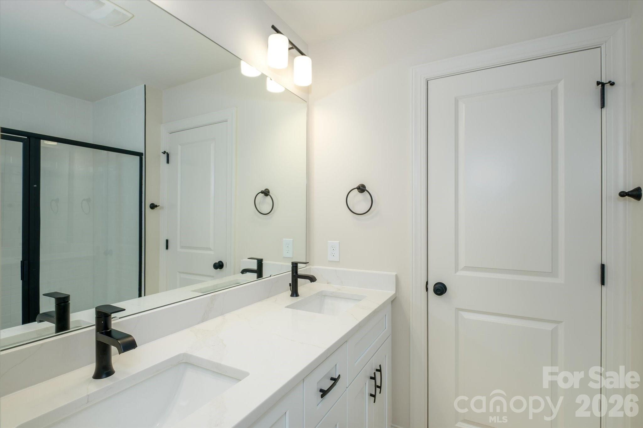 1816 East Greenbriar Road Statesville, NC 28625 - Photo 13 of 34 a bathroom with a sink a toilet and shower
