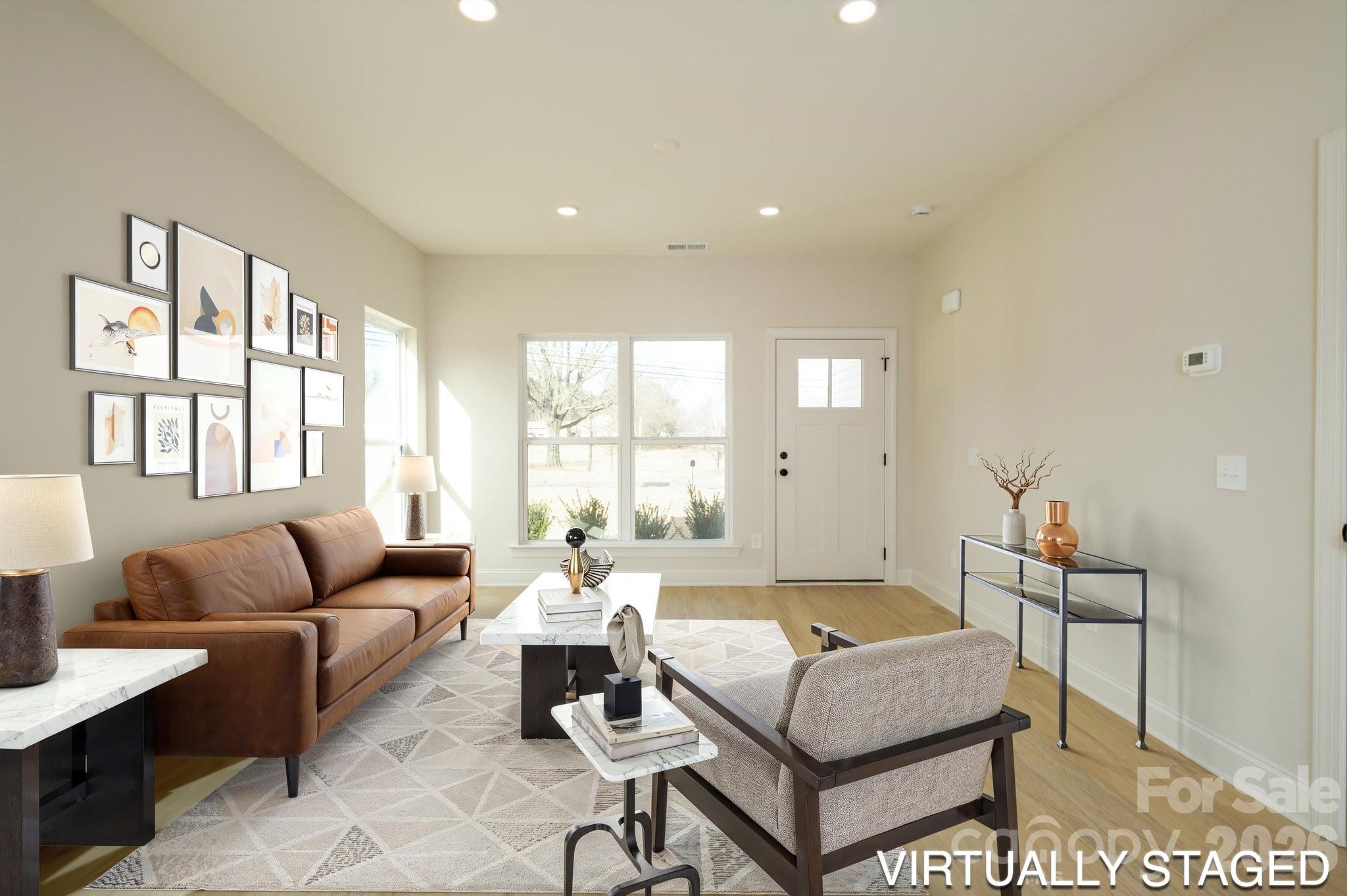 1816 East Greenbriar Road Statesville, NC 28625 - Photo 2 of 34 a living room with furniture and a large window