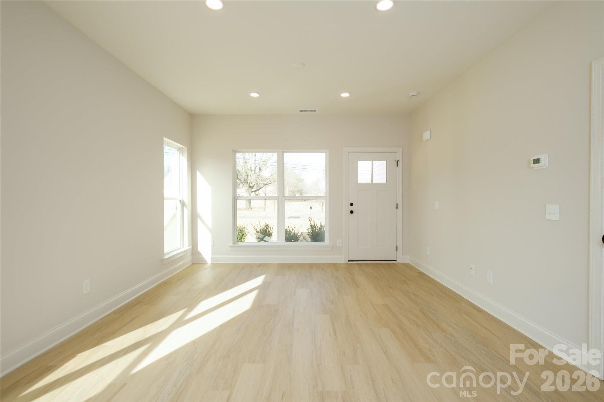 1816 East Greenbriar Road Statesville, NC 28625 - Photo 10 of 34 a view of an empty room with a window