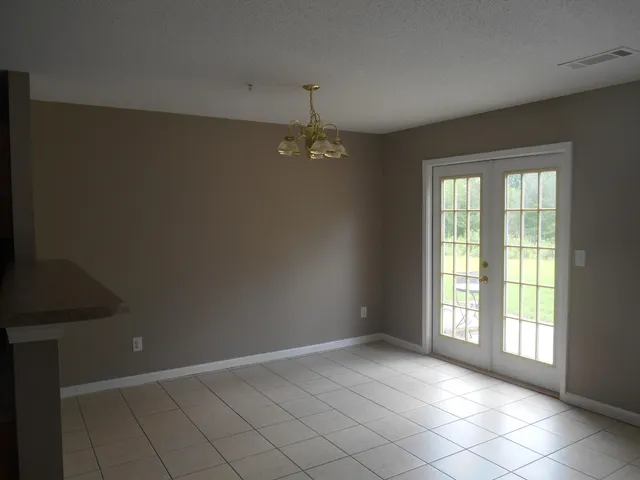 a view of an empty room with window