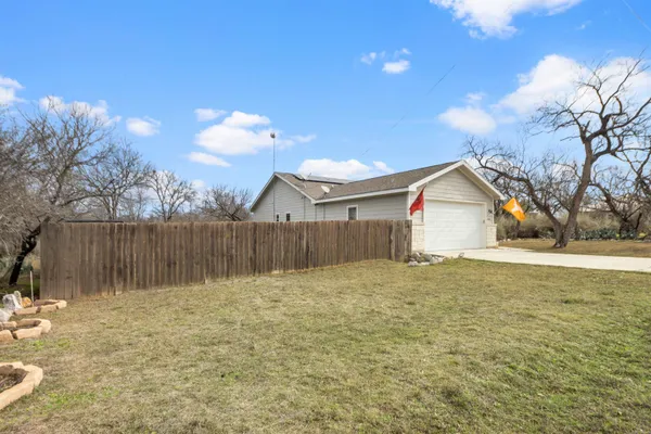 a view of backyard of house