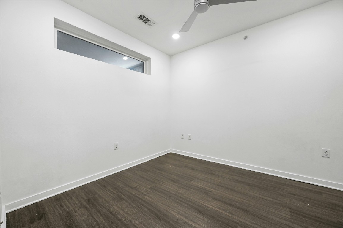4361 South Congress Avenue, Unit 129 Austin, TX 78745 - Photo 17 of 25 a view of a room with wooden floor