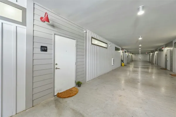 a view of a hallway with closet