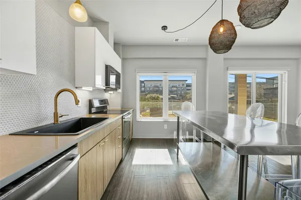 a kitchen with counter space and a sink