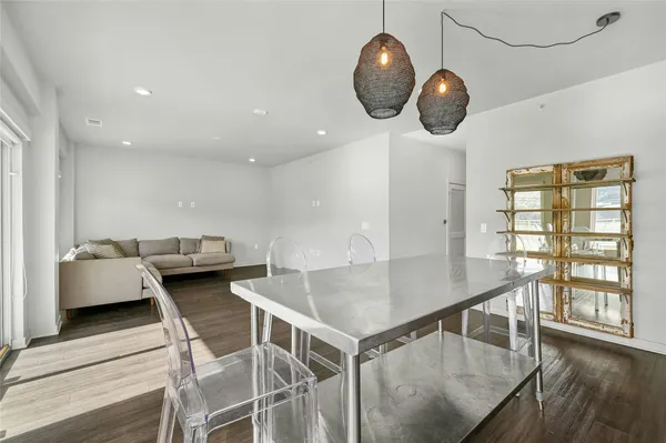 a kitchen with a table and chairs