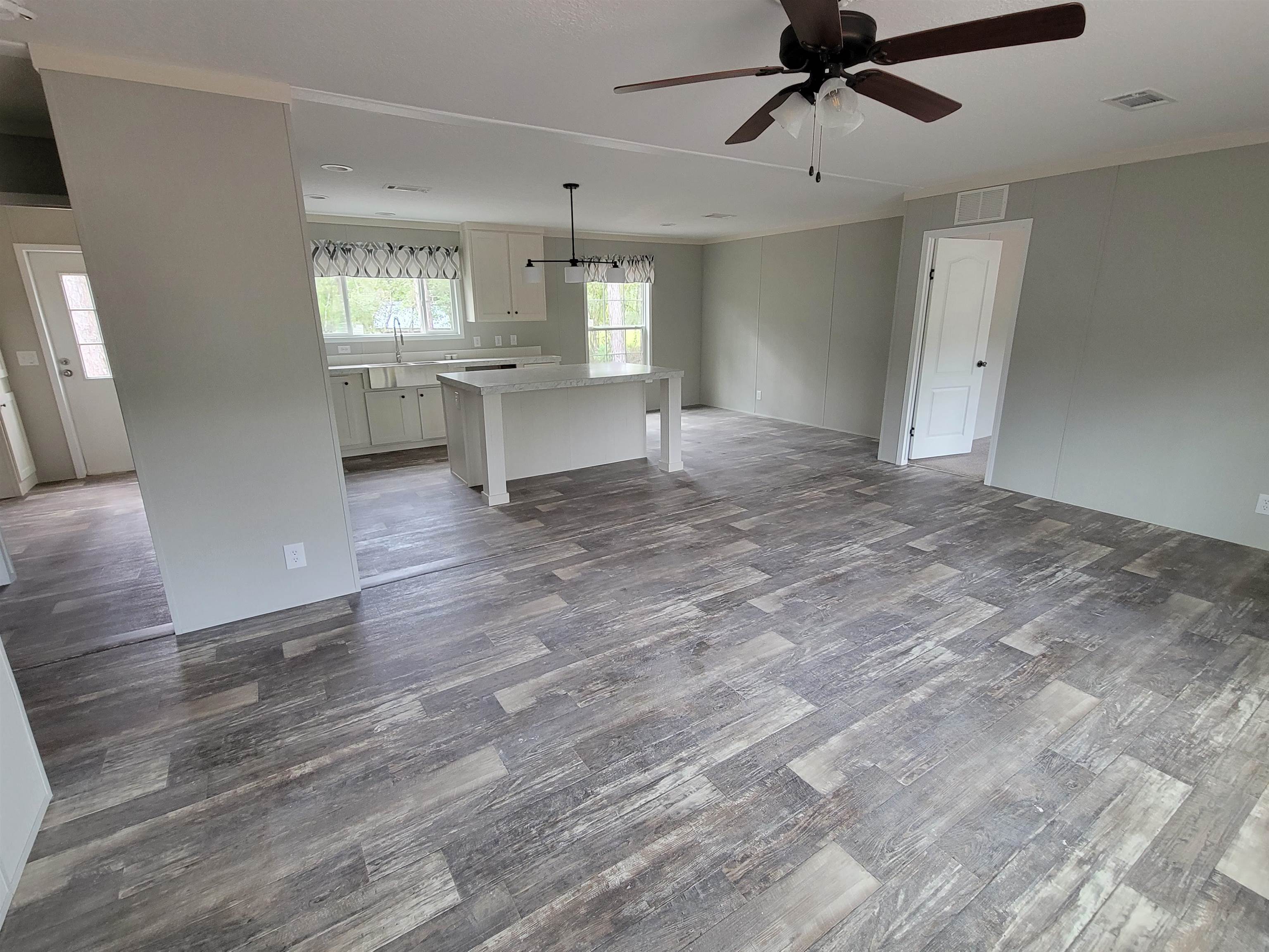 4355 Joyce Street Hastings, FL 32145 - Photo 12 of 12 a view of a kitchen with microwave and cabinets