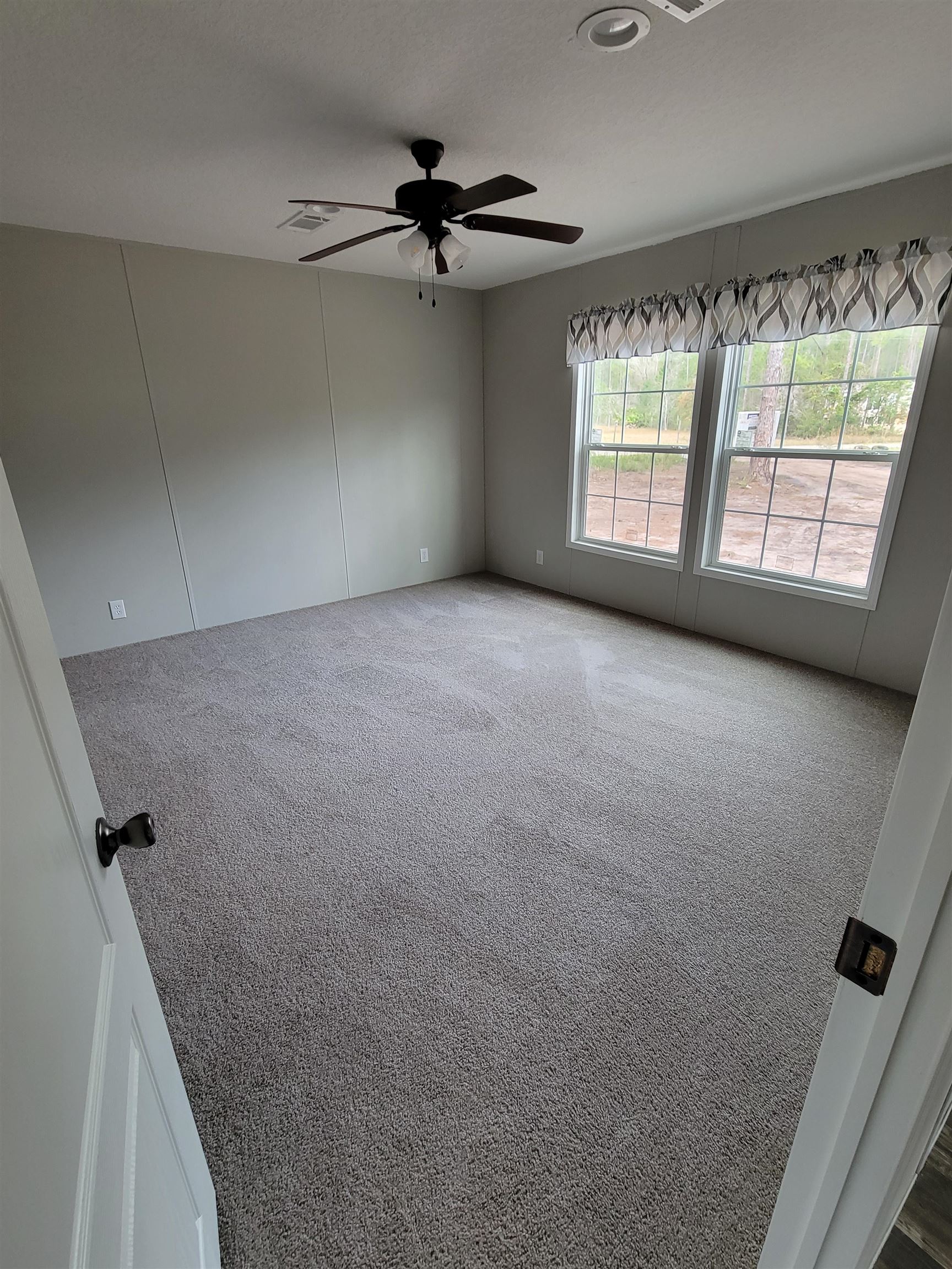 4355 Joyce Street Hastings, FL 32145 - Photo 4 of 12 a view of an empty room with a window