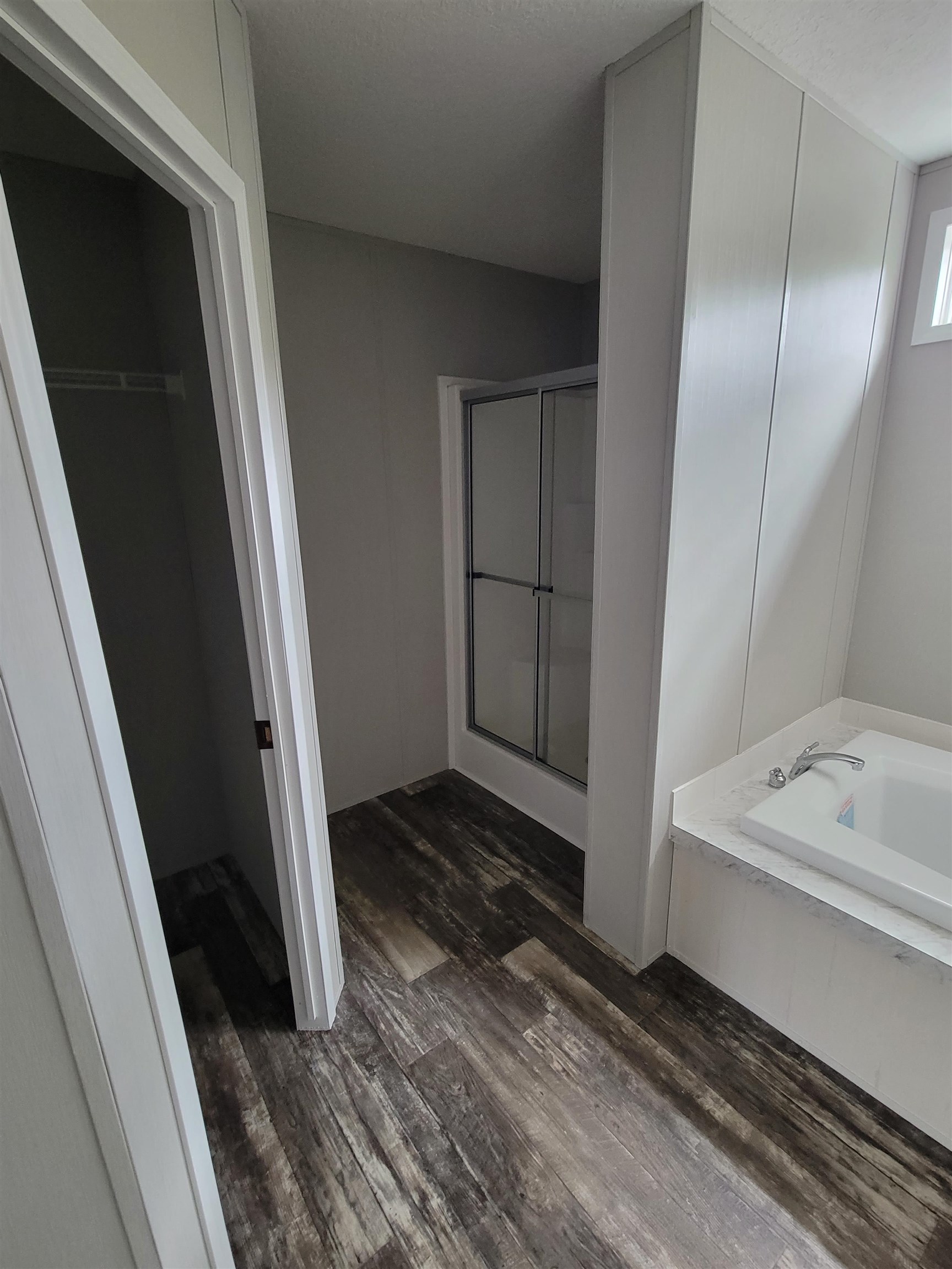 4355 Joyce Street Hastings, FL 32145 - Photo 6 of 12 a bathroom with a sink and a shower