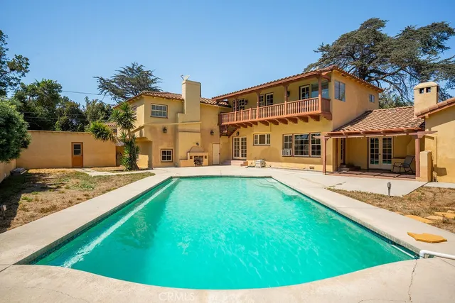 a view of a house with a swimming pool
