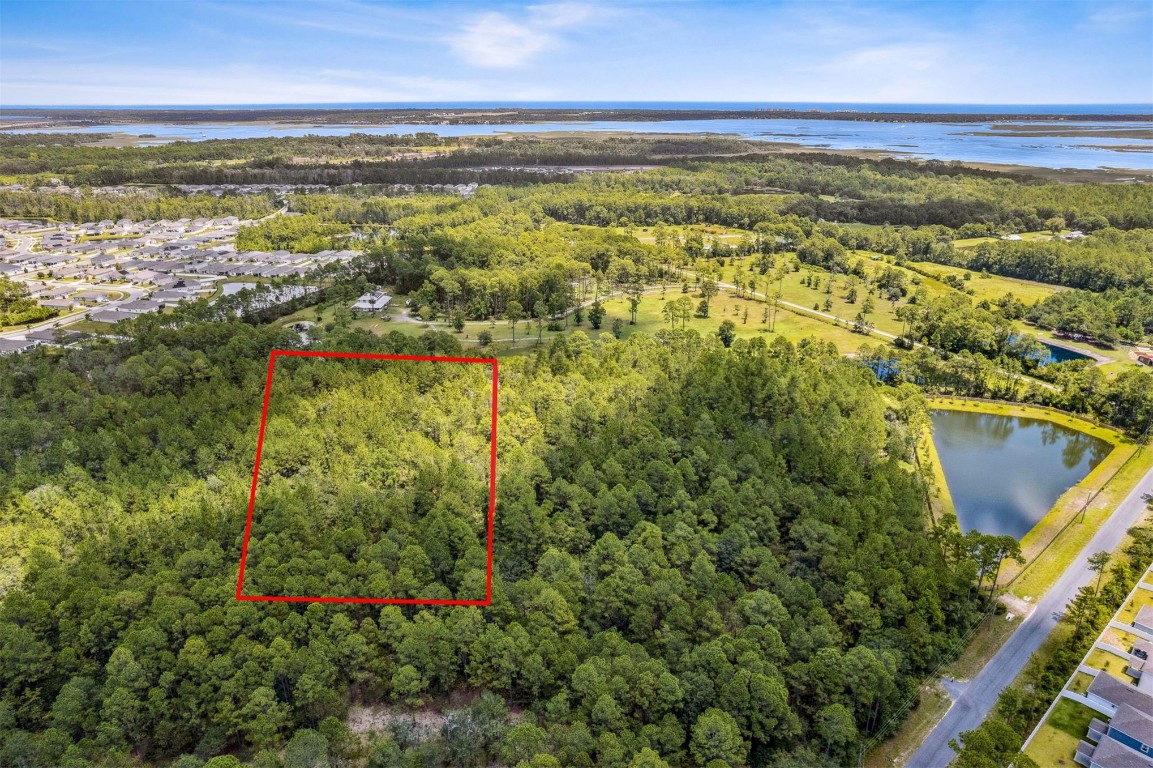 a view of a city with an ocean