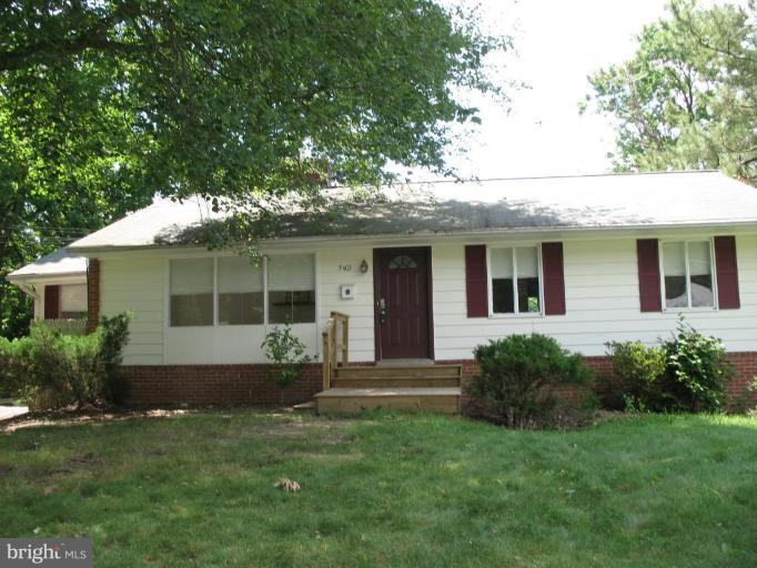 5403 Littleford Street Springfield, VA 22151 - Photo 1 of 21 a front view of house with yard and green space
