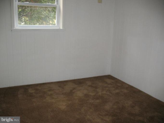 5403 Littleford Street Springfield, VA 22151 - Photo 11 of 21 an empty room with a window